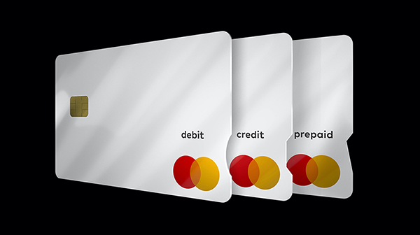 Image 3 shows Examples of Mastercard's accessible debit, credit and prepaid cards with unique shapes cut out of the end of each that clearly identify what kind of card it is. Debit card has a rounded cut out, credit has the top half of a hexagon cut out. Prepaid has a pointed edge cut out.