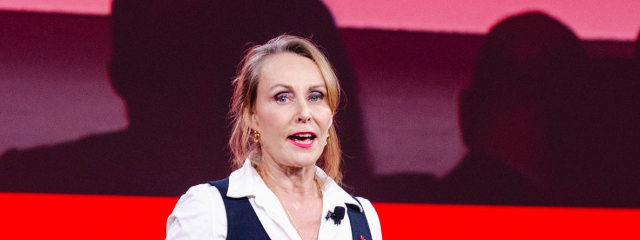 Susan Hawkins delivering her closing speech at the 2025 SUMMIT