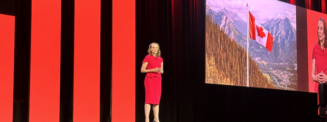 Susan E. Hawkins on the main stage of The 2026 SUMMIT