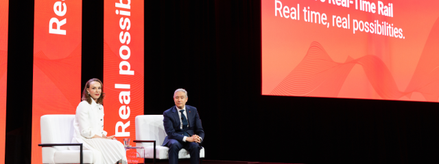 Minister Champagne and Susan E. Hawkins on The SUMMIT main stage