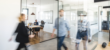 People in a bright office setting