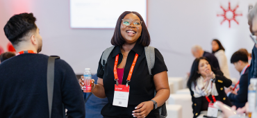 The 2026 SUMMIT: Payments Canada employee smiling